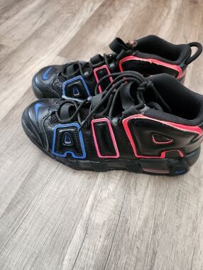 Nike Kids Black Athletic Shoes with Blue and Red Accents